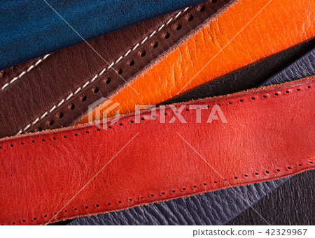 Leather colored straps close-up. 42329967