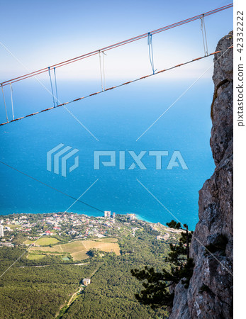 Rope bridge above chasm, Crimea Rope bridge above chasm, Crimea 42332222
