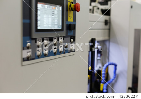 modern industrial equipment with CNC control panel 42336227