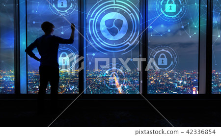 NEM cryptocurrency security theme with man by large windows at night 42336854