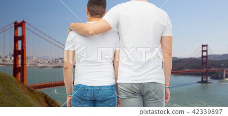 male couple with gay pride rainbow wristbands male couple with gay pride rainbow wristbands 42339897