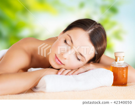 close up of beautiful woman having massage at spa close up of beautiful woman having massage at spa 42340050