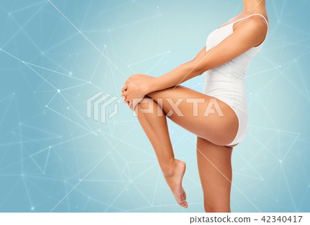 close up of young woman body in white underwear close up of young woman body in white underwear 42340417