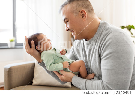 happy father with little baby boy at home 42340491