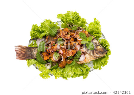 fried Fish and vegetables on a plate fried Fish and vegetables on a plate 42342361