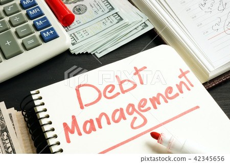Debt management. Notepad, calculator and money. 42345656