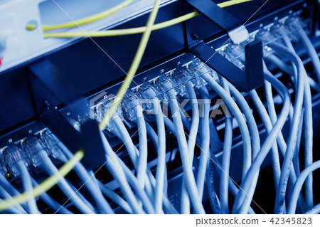 modern high tech internet data center room with Network panel, switch and cable modern high tech internet data center room with Network panel, switch and cable 42345823