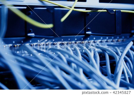 modern high tech internet data center room with Network panel, switch and cable modern high tech internet data center room with Network panel, switch and cable 42345827