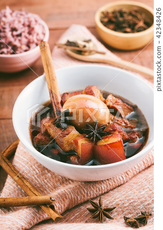 Eggs and pork in brown sauce,Thai Cuisine. Eggs and pork in brown sauce,Thai Cuisine. 42348426