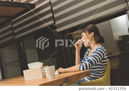 sick Asian woman 42351359
