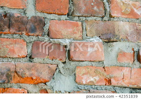Old red brick wall in the street background Old red brick wall in the street background 42351839