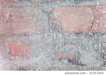 Pieces of broken glass on the wall macro Pieces of broken glass on the wall macro 42351840