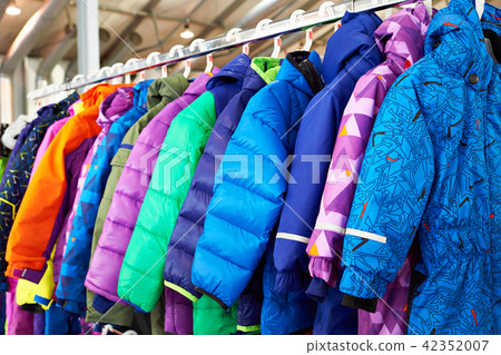 Winter children sports jacket on hanger in store Winter children sports jacket on hanger in store 42352007