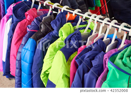 Winter children sports jacket on hanger in store 42352008
