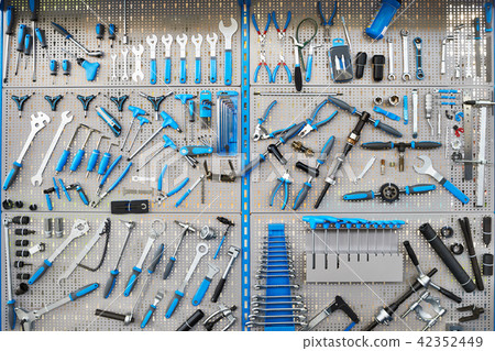 Stand with set tools on bicycle workshop 42352449