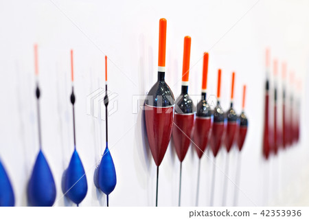 Fishing floats on white wall Fishing floats on white wall 42353936