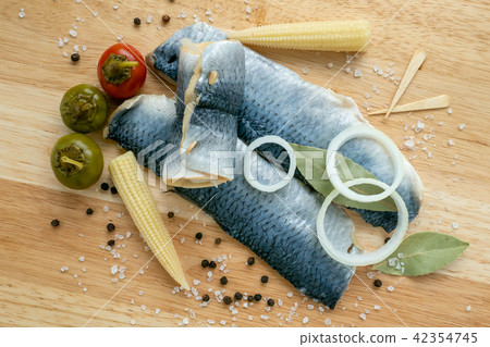 Herring fillet marinated. Cold appetizer.  42354745