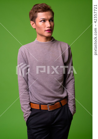 Androgynous young Asian man wearing makeup Androgynous young Asian man wearing makeup 42357721