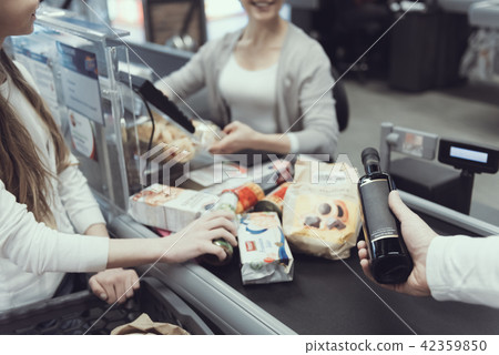 Father and Daughter Buying Products in Supermarket 42359850