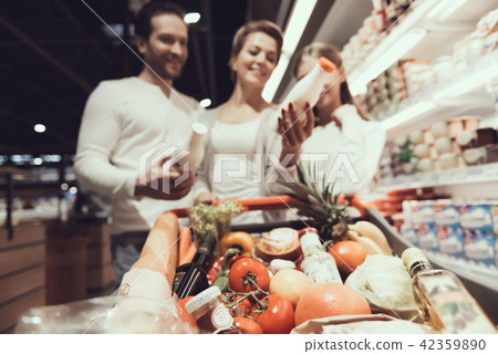 Close up Family in Supermarket in Dairy Department 42359890