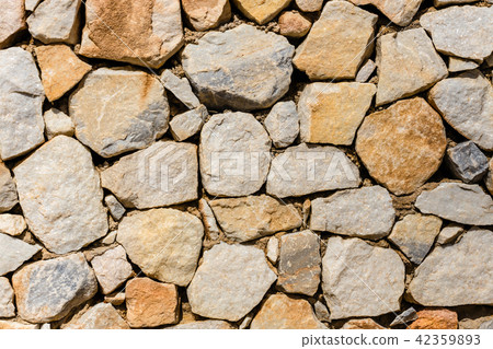 Texture of a stone wall as background 42359893