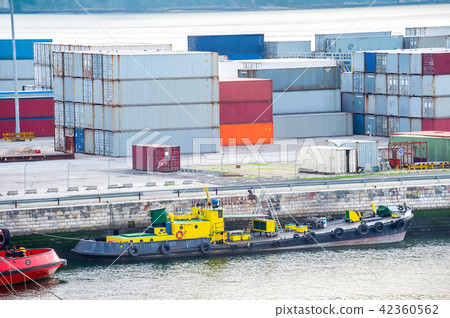 Moored boats and freight containers Moored boats and freight containers 42360562