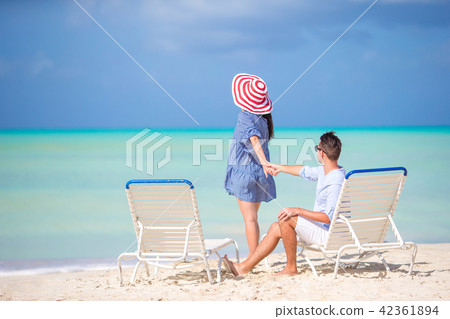Couple relax on a tropical beach at Maldives 42361894