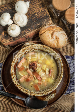 The sour soup made of rye flour. The sour soup made of rye flour. 42362338