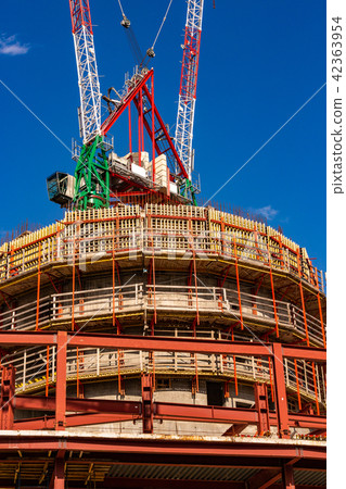 Construction site with cranes and building Construction site with cranes and building 42363954