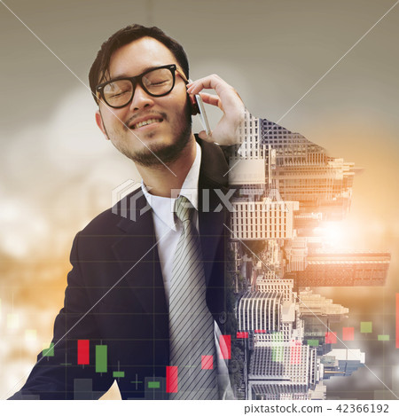 Double exposure businessman using mobile phone. 42366192