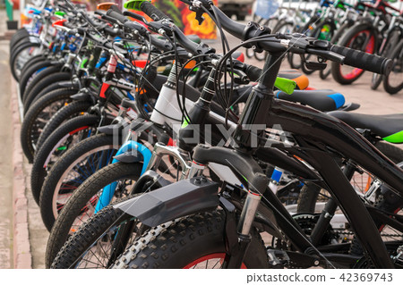 Parking of brand new teenager's bicycles, sale Parking of brand new teenager's bicycles, sale 42369743