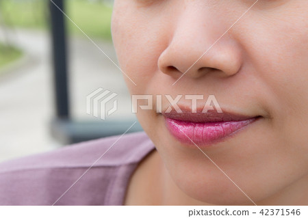Beautiful woman lips closeup. Beautiful woman lips closeup. 42371546