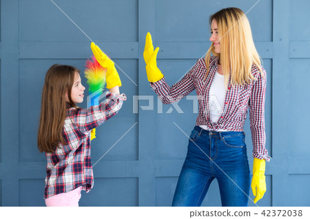 family teamwork household chores mom kid high five family teamwork household chores mom kid high five 42372038