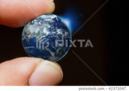 Touch Earth with finger 42372047