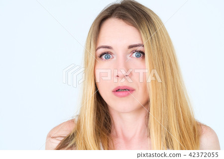 emotion face overwhelmed shocked perplexed woman 42372055