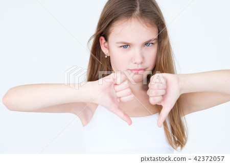 emotion annoyed displeased child thumbs down girl emotion annoyed displeased child thumbs down girl 42372057