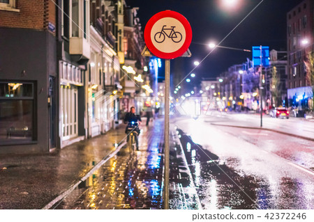 Bicycle lane sign on a night street Bicycle lane sign on a night street 42372246