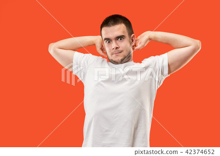 The young attractive man looking suprised The young attractive man looking suprised 42374652