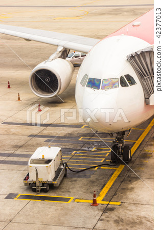 Aircraft maintenance main gear checking in airport 42377013