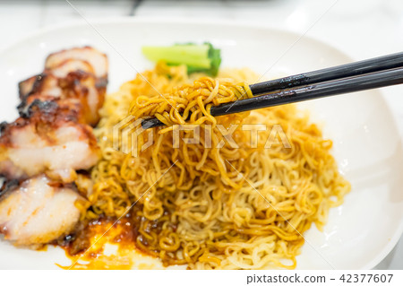 Egg noodle with roasted red pork 42377607