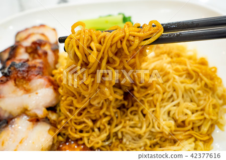 Egg noodle with roasted red pork Egg noodle with roasted red pork 42377616