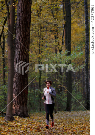 Full-length image of athlete girl on morning run Full-length image of athlete girl on morning run 42377965