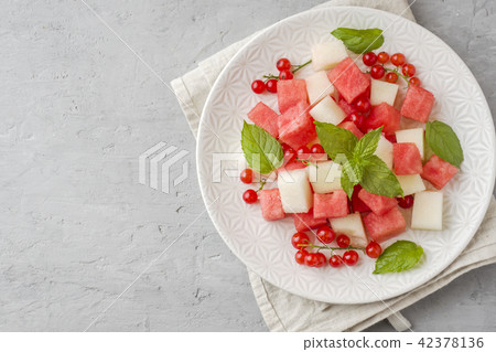 Salad of fresh juicy pieces of watermelon, melon Salad of fresh juicy pieces of watermelon, melon 42378136