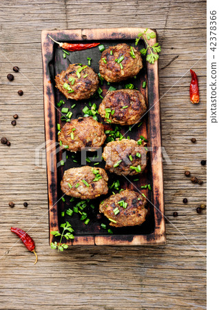meatballs on cutting board 42378366