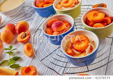 Ingredients for french dessert apricot clafoutis 42378575