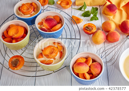 Ingredients for french dessert apricot clafoutis 42378577