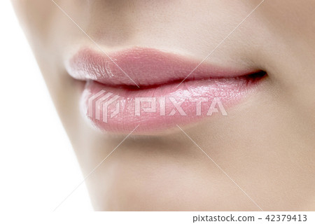Closeup of lipstick Beauty image of young women 42379413
