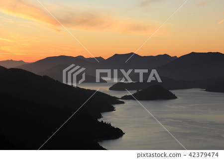 Sunset scene in the Marlborough Sounds. Sunset scene in the Marlborough Sounds. 42379474