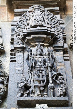 Ornate wall panel reliefs depicting Lord Vishnu Ornate wall panel reliefs depicting Lord Vishnu 42381748