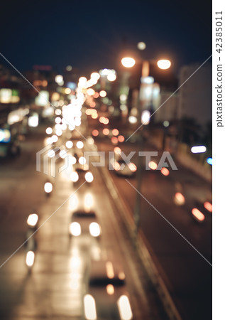 Night road in the city of lights cars traffic Night road in the city of lights cars traffic 42385011